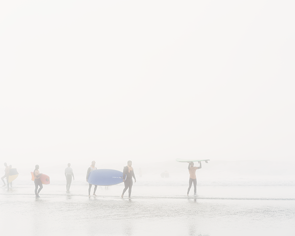 Surfers traverse a foggy SF beach in this brand new Baguskas.