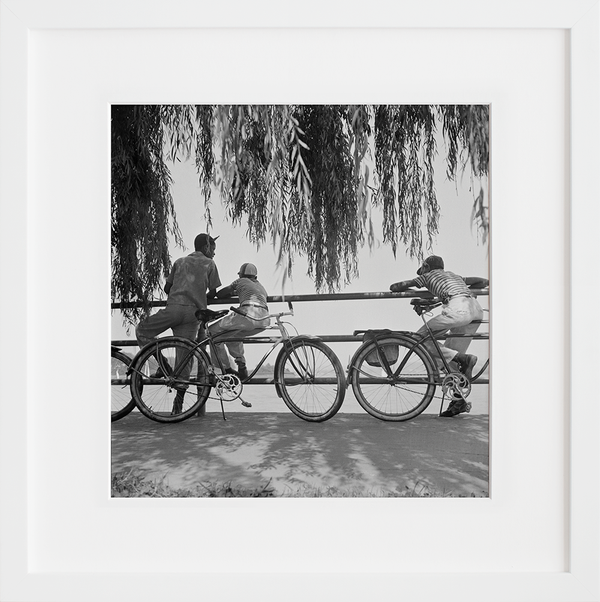 Washington, D.C. Sunday cyclists watching sailboats