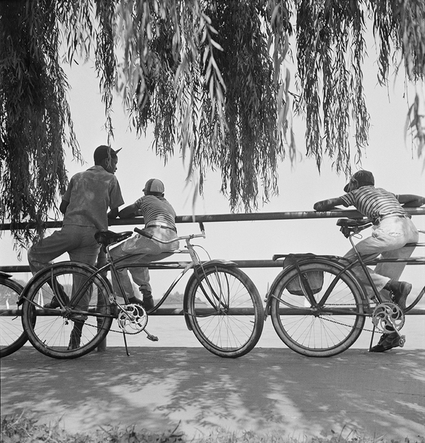 Washington, D.C. Sunday cyclists watching sailboats
