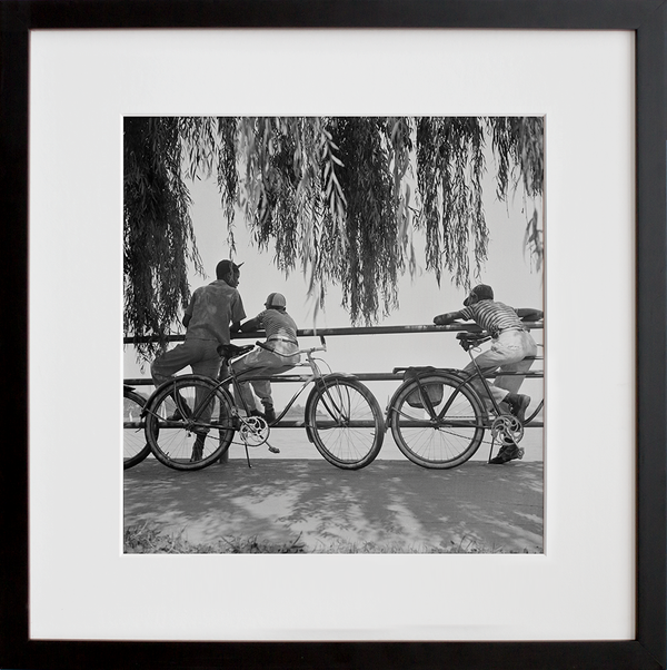 Washington, D.C. Sunday cyclists watching sailboats
