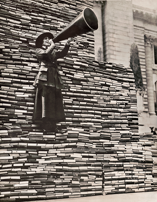 A gutsy vintage gal + a book bonanza? We’re all over this b&w photo.