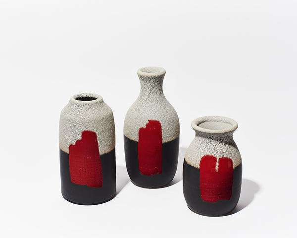 New! Kyle Scott Lee’s “Red Sun Vases” are a ray of light.