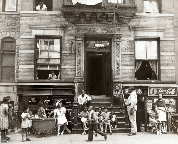 This b&w Harlem stoop scene spreads some old school summer joy.