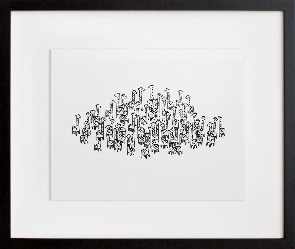50 (+1 for good luck) Giraffes in a black frame