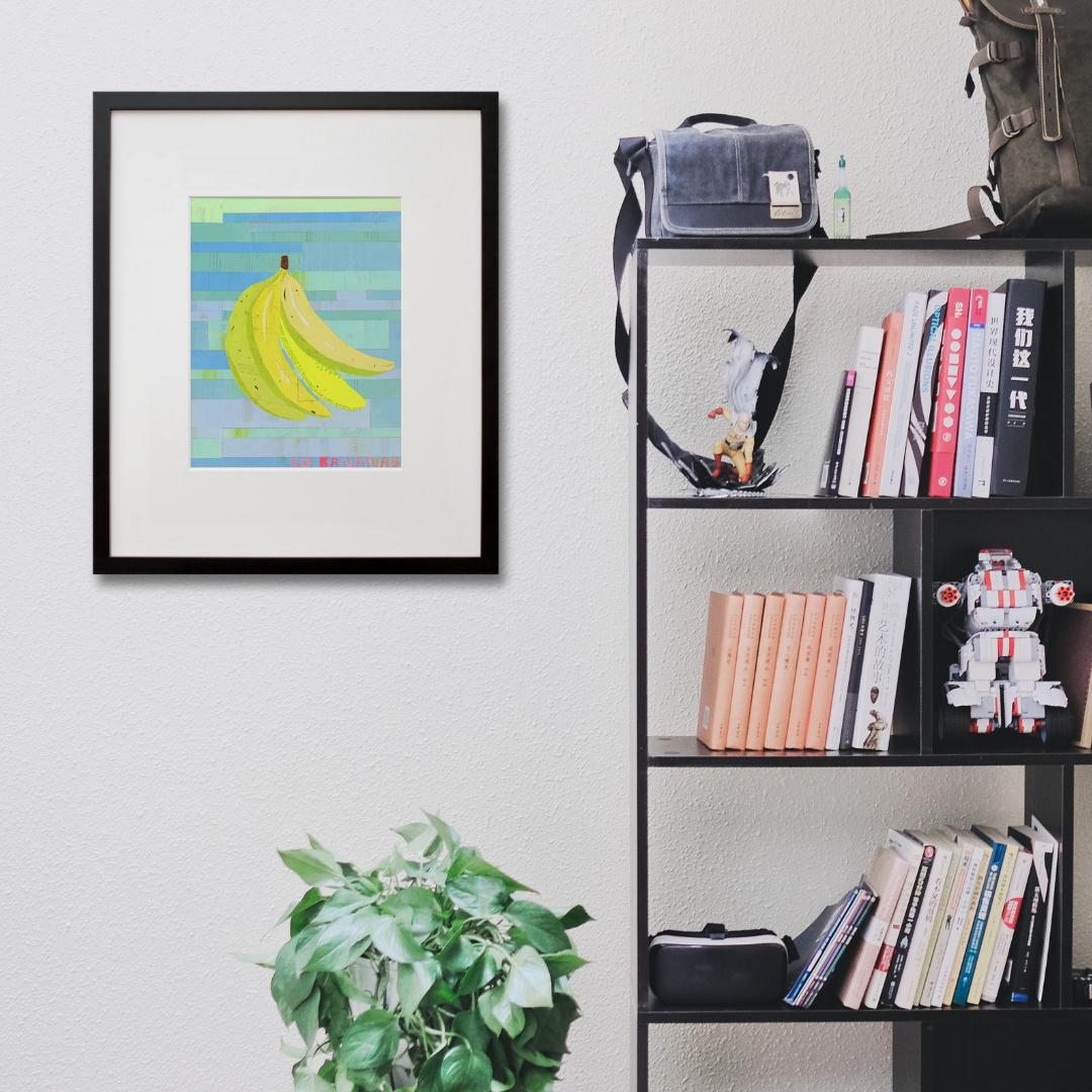 Go Bananas in a black frame on a wall