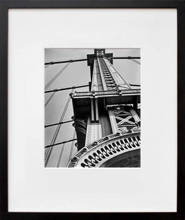Manhattan Bridge, Looking Up by Berenice Abbott in black frame