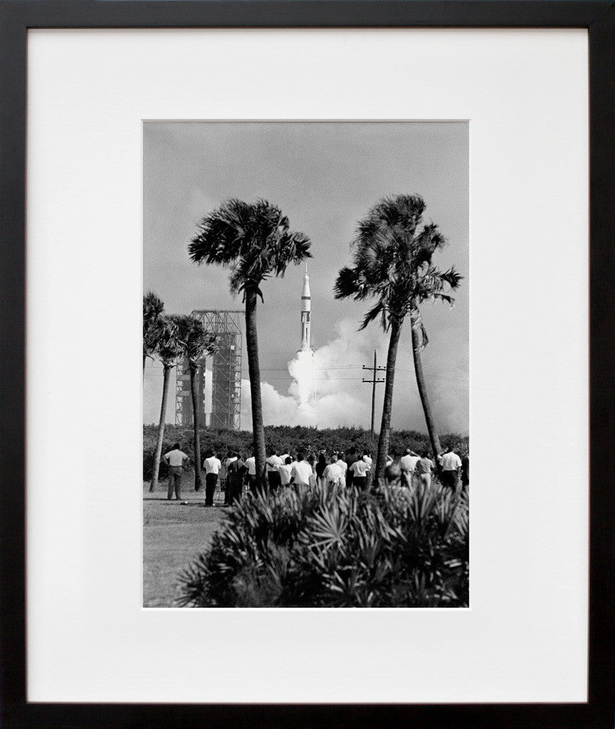 S68-48662: spectators watching the Apollo 7 launch, in a black frame