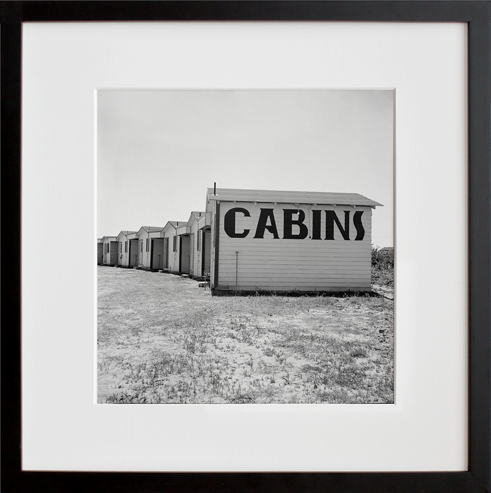 Cabins on US 99 in a black frame