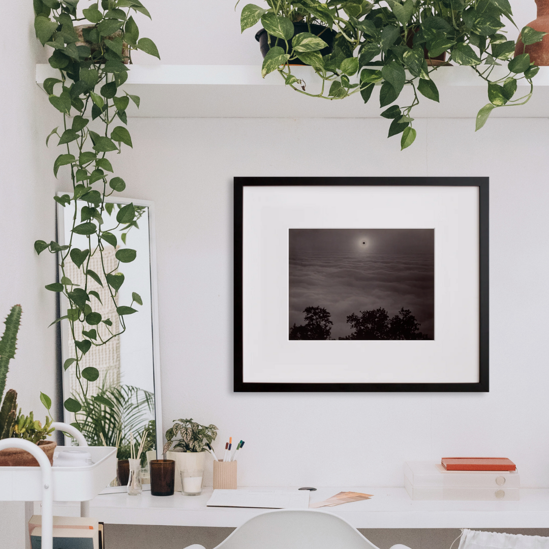 Solar Eclipse in a black frame on a wall