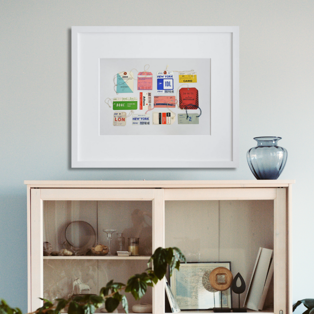 Day 256: Vintage Airline Tags in a white frame on a wall
