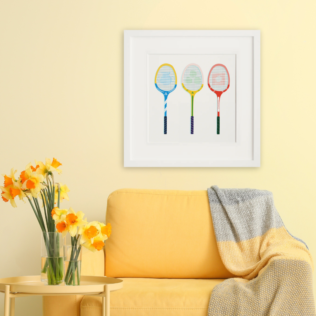 Grand Slam in a white frame on a wall
