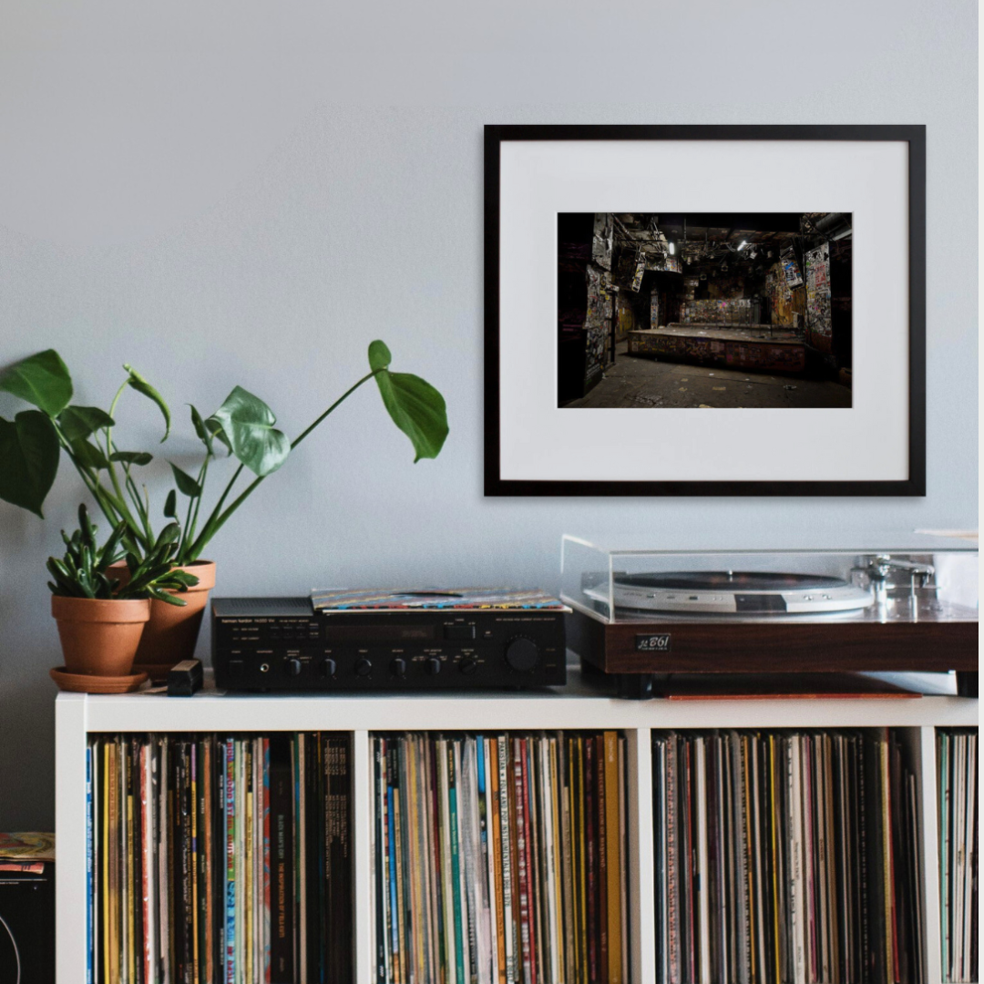 CBGB (Stage) in a black frame on a wall