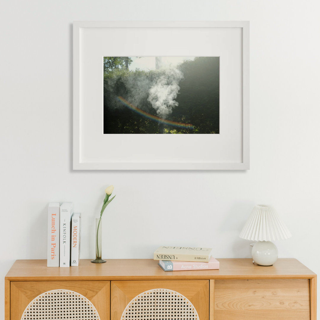 Smoke in a white frame on a wall