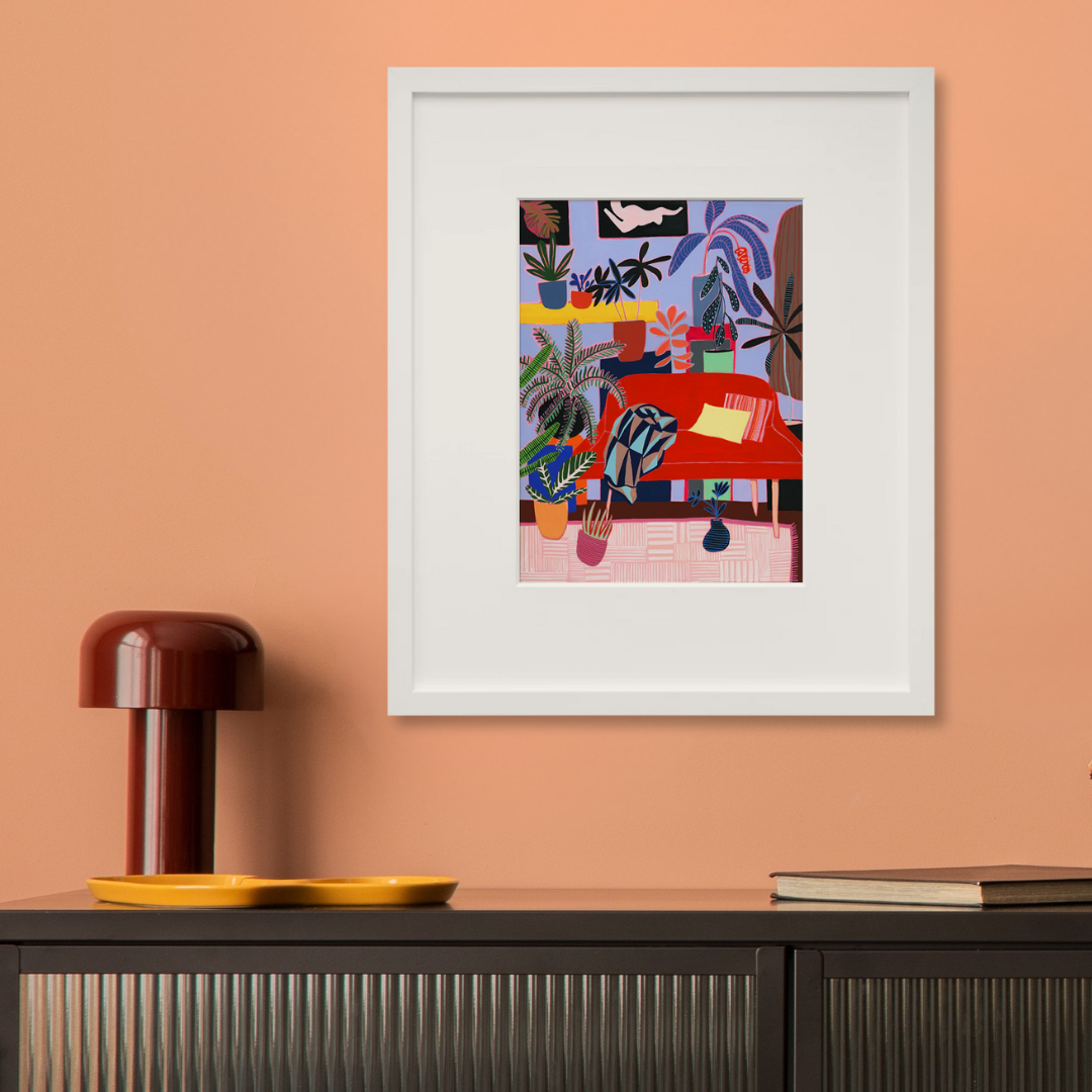 Studio View in a white frame on a wall