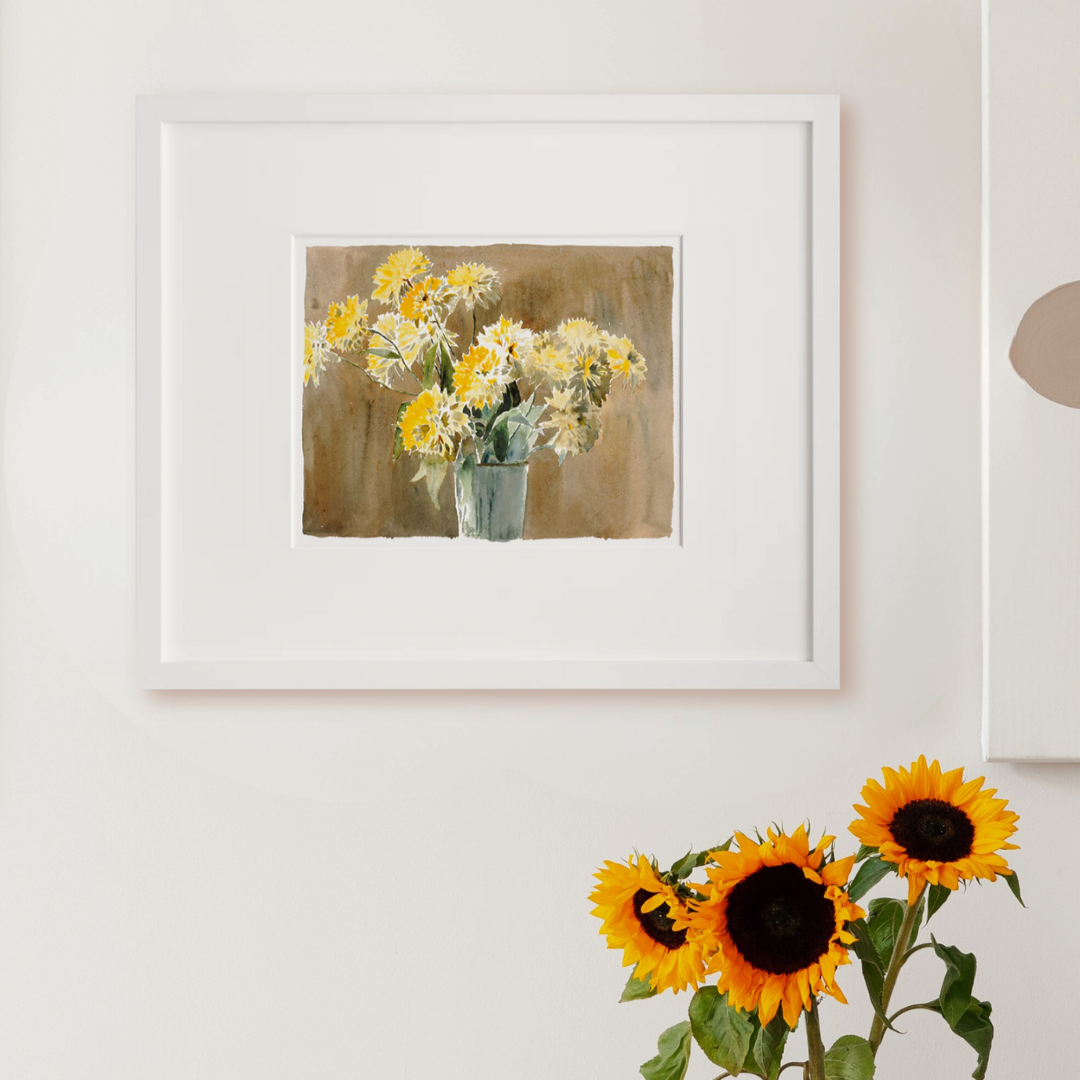 Vase with Yellow Flowers in a white frame on a wall