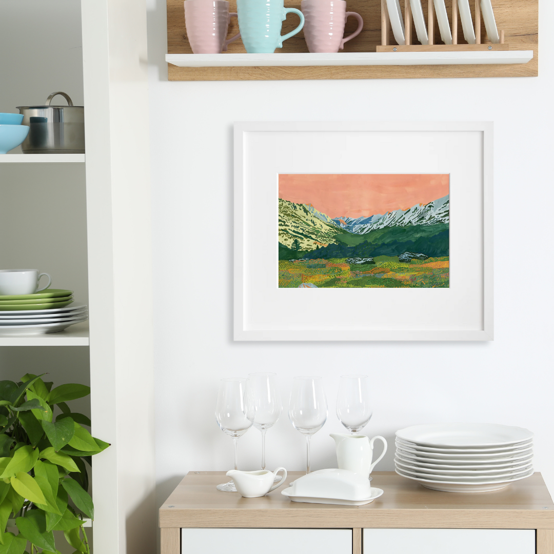 Alpine Glow in the Valley in a white frame on a wall