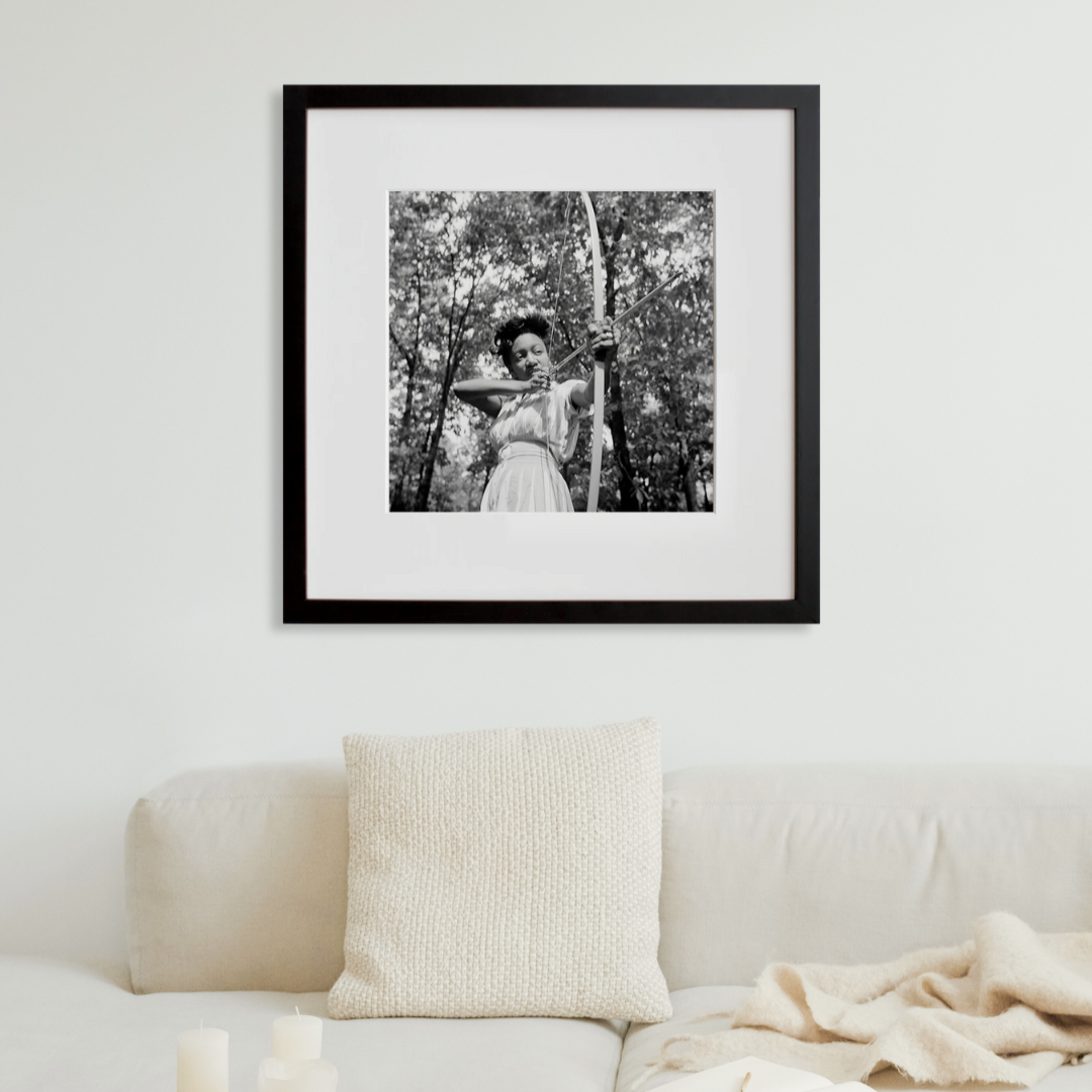Camp Fern Rock (archer) in a black frame on a wall