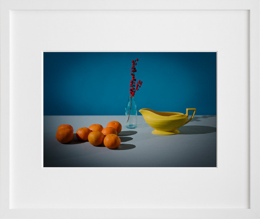 Oranges in a white frame