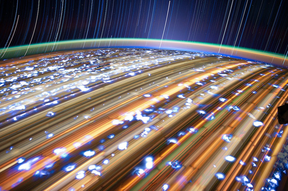 jsc2012e052676: star trails over Earth's city lights, photographed from the International Space Station