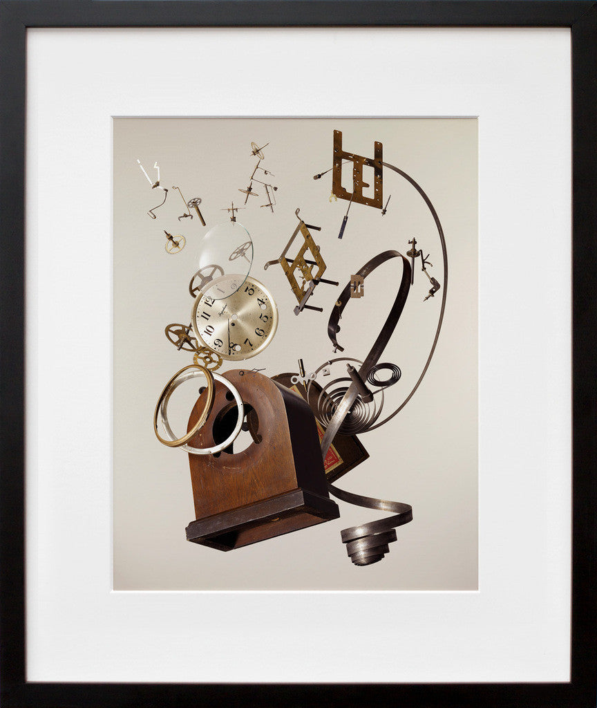 Apart Wind-Up Clock in a black frame