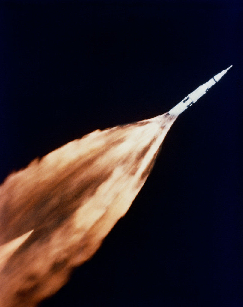 S68-27366: a Saturn V rocket climbing through the sky on a trail of flame