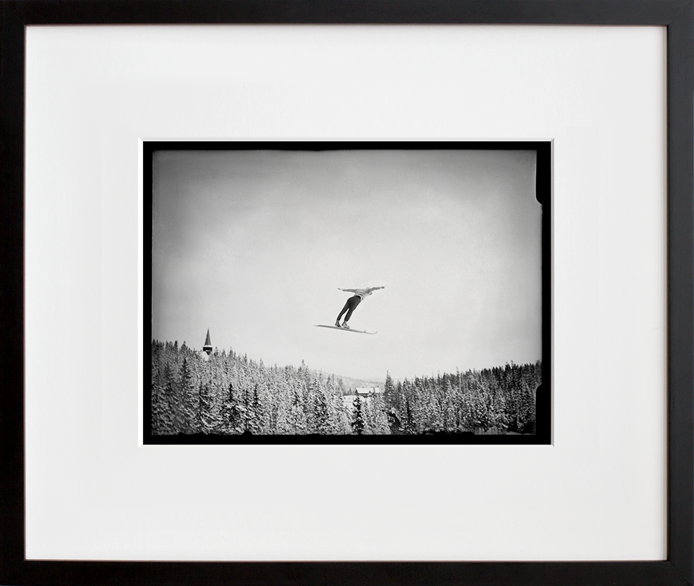 Ski Jumper in a black frame