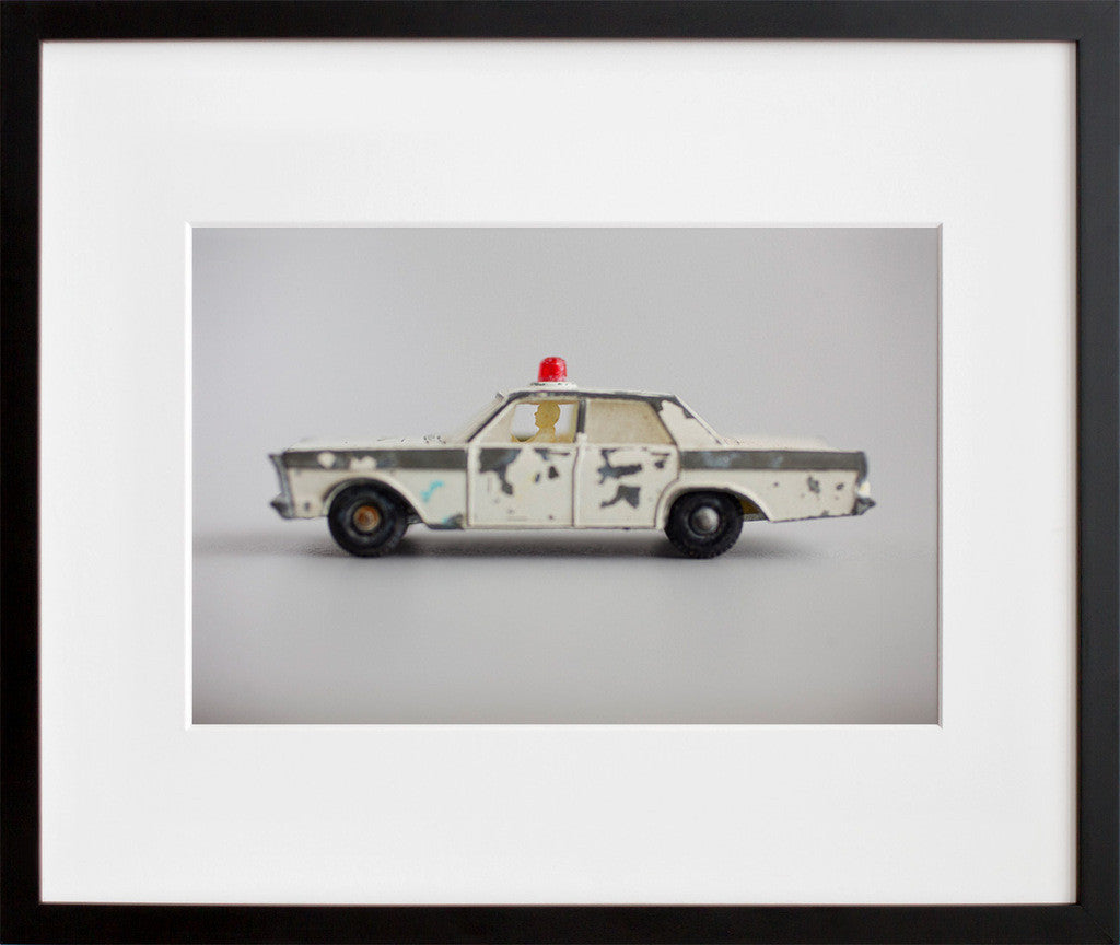 Copper in a black frame