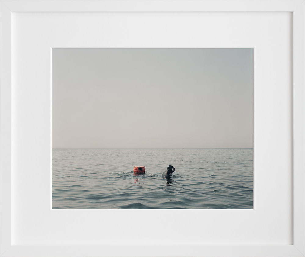 Haenyo Emerging for Air in a white frame