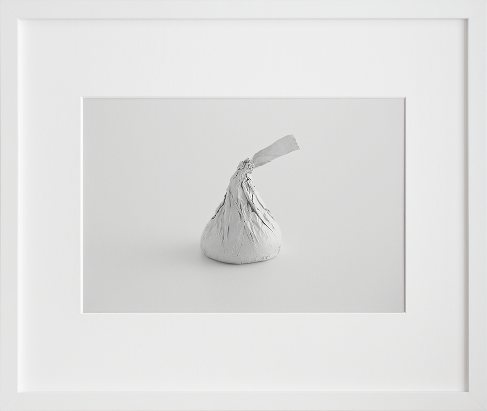 Hershey's Kisses in a white frame