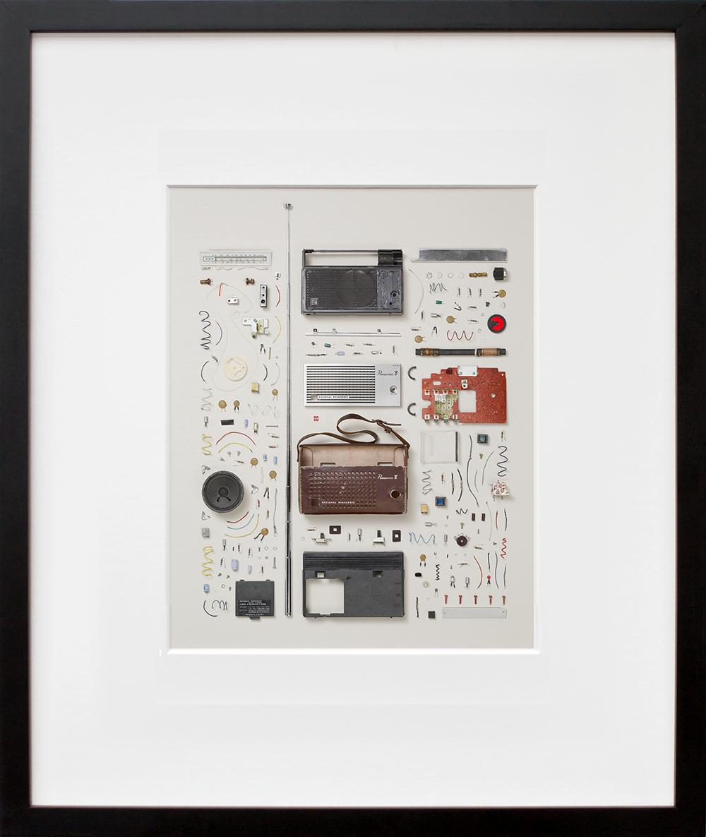 Disassembled Radio in a black frame